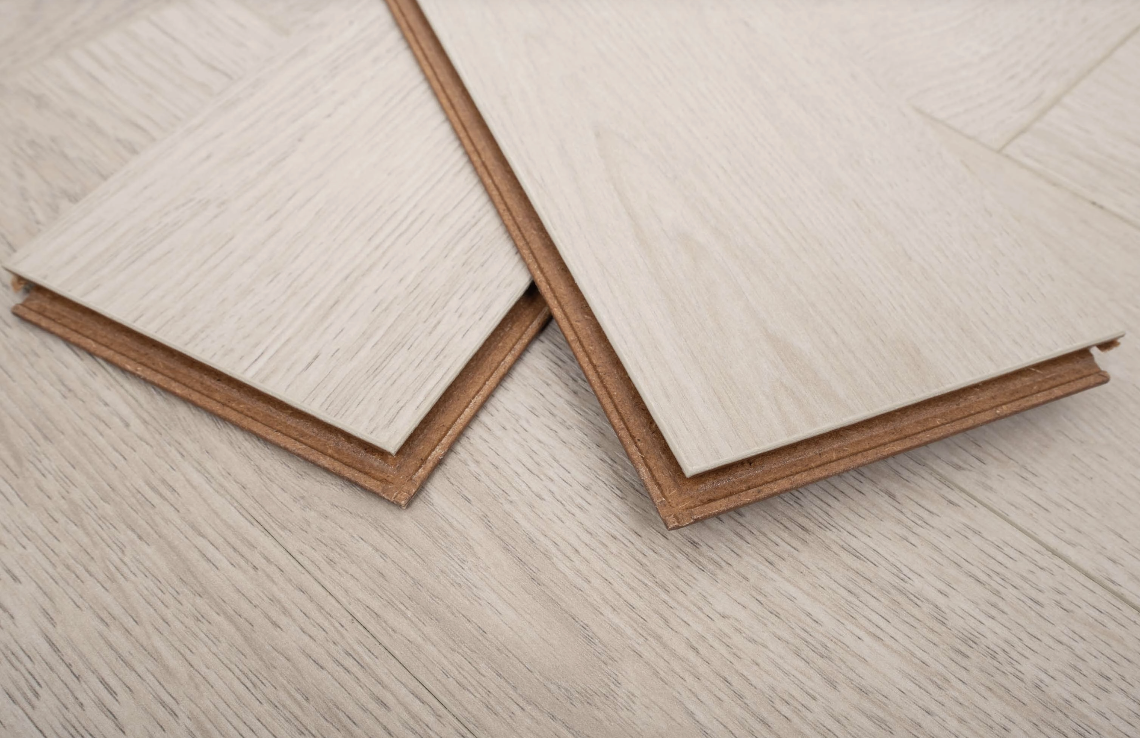 Light Grey 8mm Herringbone Laminate Floor | 1.8m² Pack Coverage